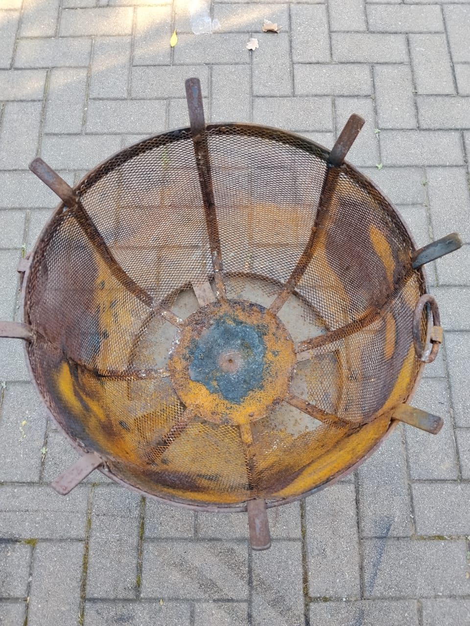 Cast iron fire pit basket before cleaning